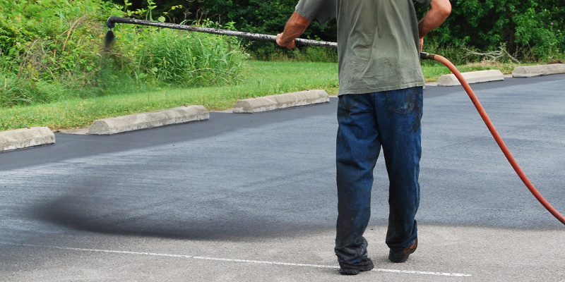 Four Ways Sealcoating Extends the Life of Your Driveway